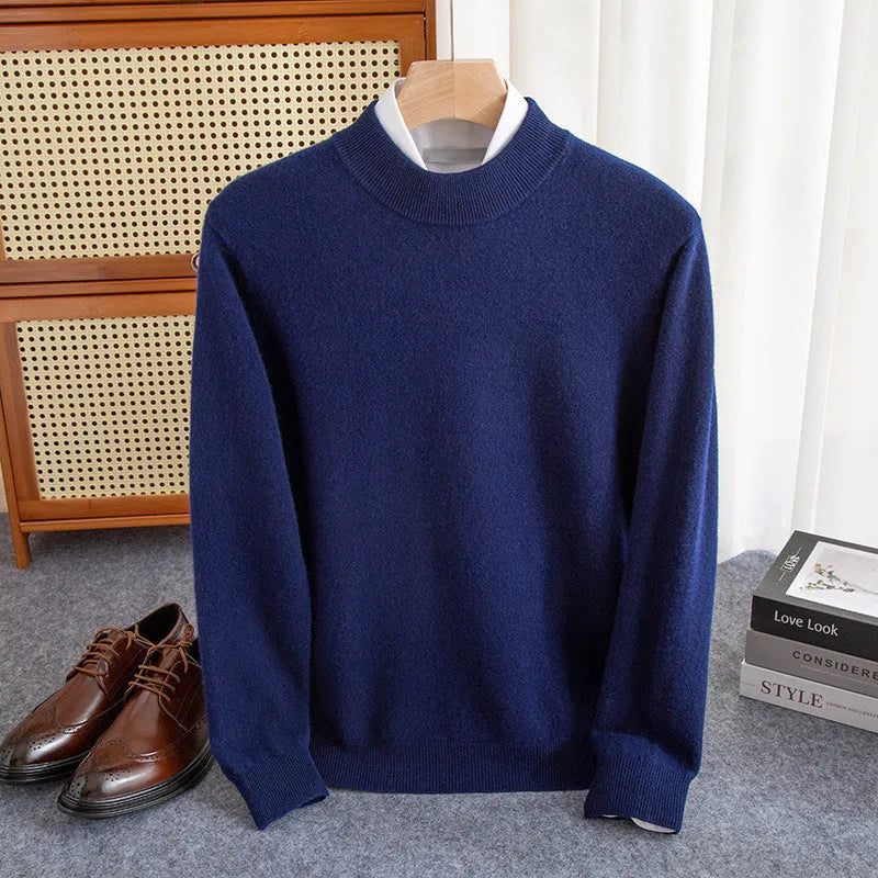 Man wearing a loose-fit half-collar wool sweater in a textured knit, shown in one of the available colours like camel or dark grey.