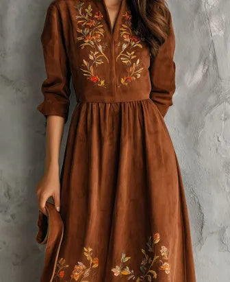 Brown midi dress with floral embroidery on suede-textured fabric, knee-length vintage style