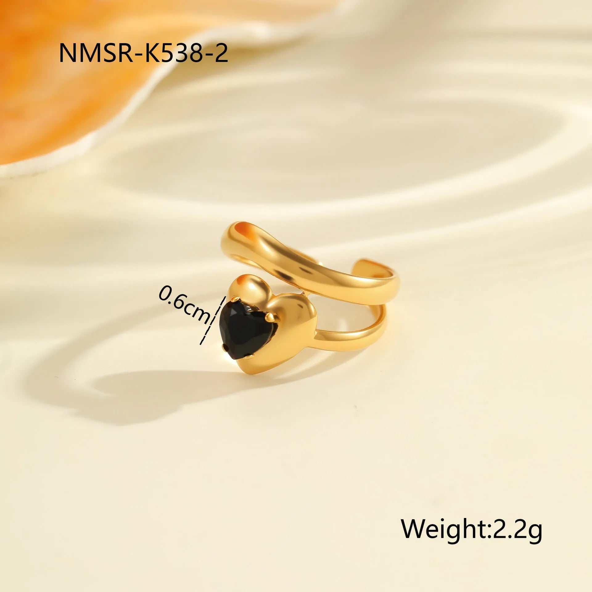 Adjustable open mouth titanium steel ring for women with inlaid zircon stones in a geometry design.
