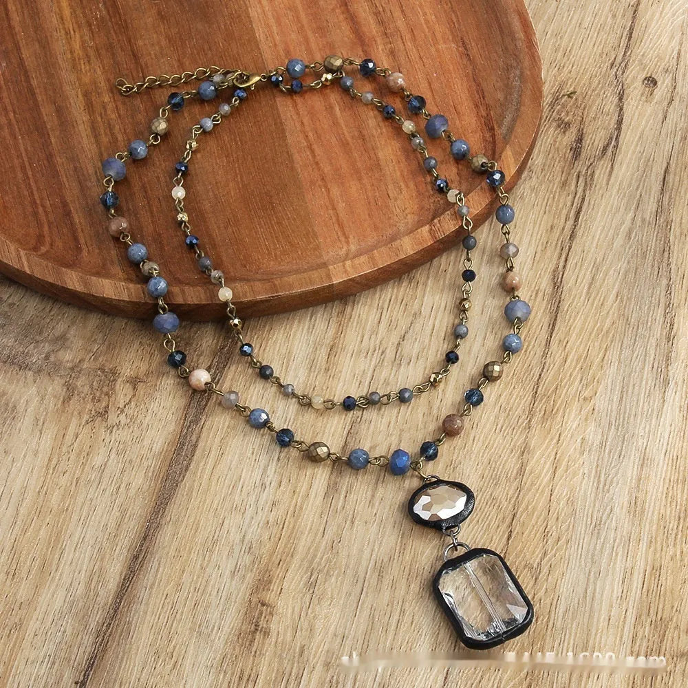 Tribal style layered necklace with natural stone and glass pendant on adjustable chain
