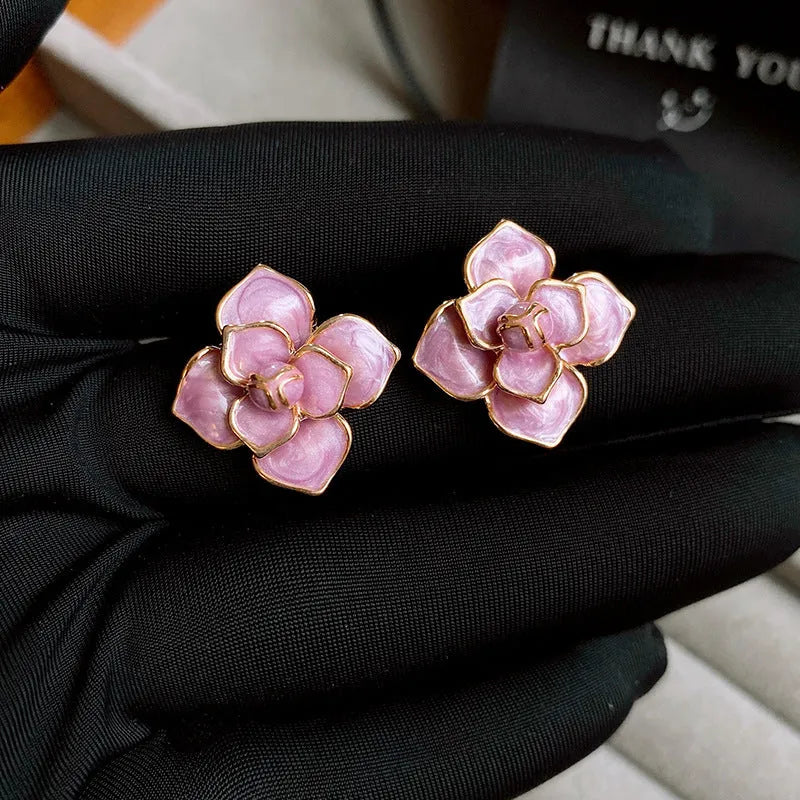Purple oil-spot glaze flower stud earrings with gold-plated silver needle detailing on copper base