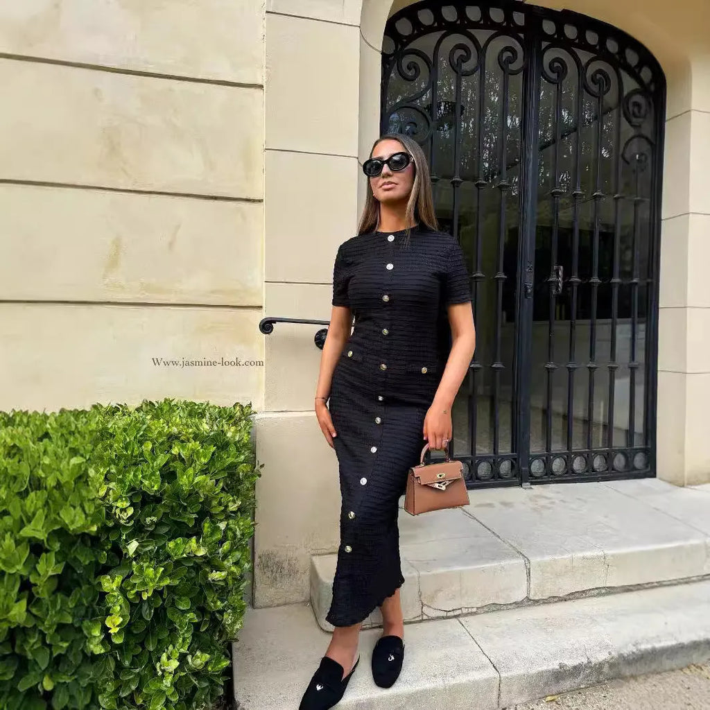 French retro slim fit knitted long-sleeved dress with button front in black or white.