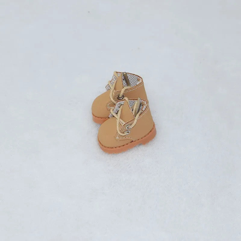 Set of miniature doll replacement shoes in various styles and colours for 17cm scale figures.