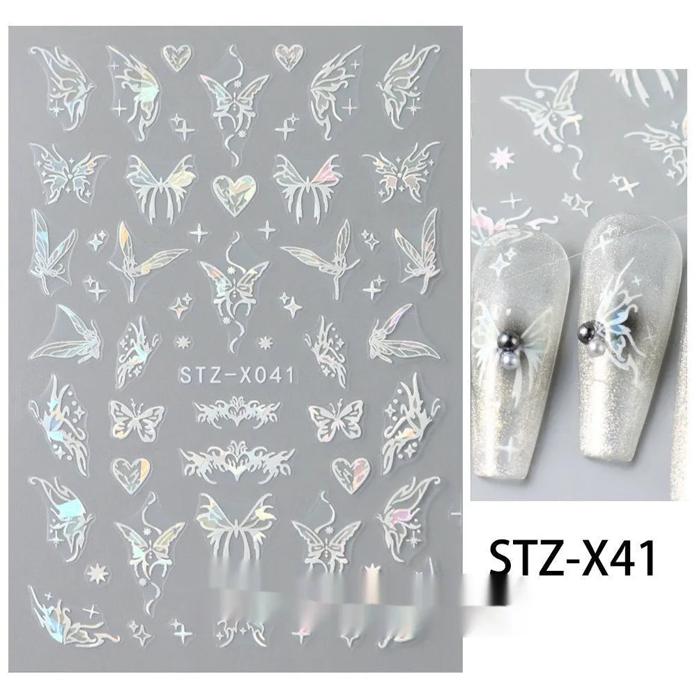 Plastic sheet of black, silver, and cartoon design nail art stickers for DIY manicures.