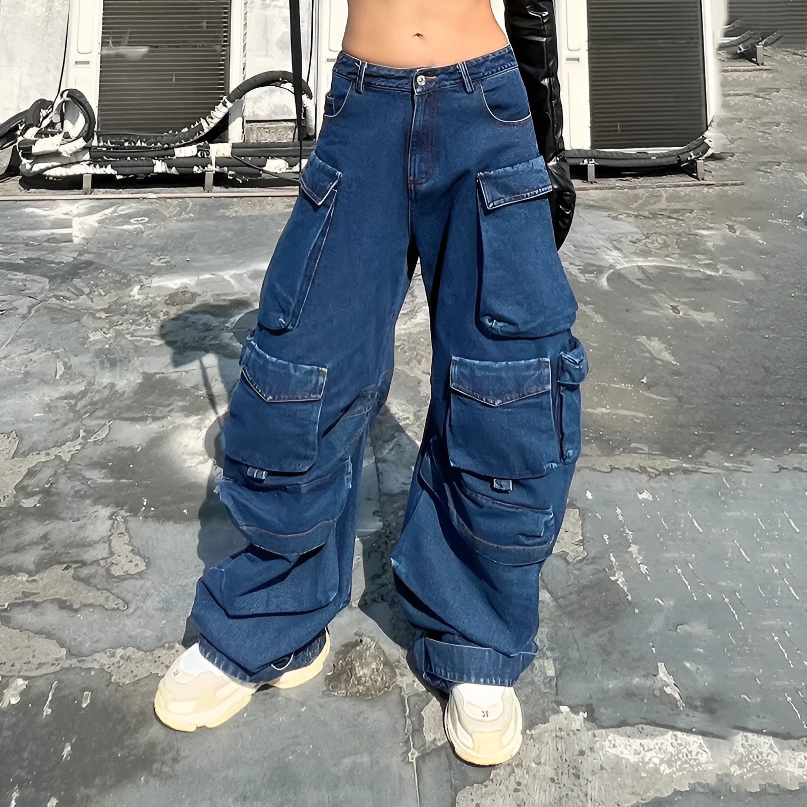 Dark blue distressed wide-leg jeans with high waist and multiple pockets on mannequin