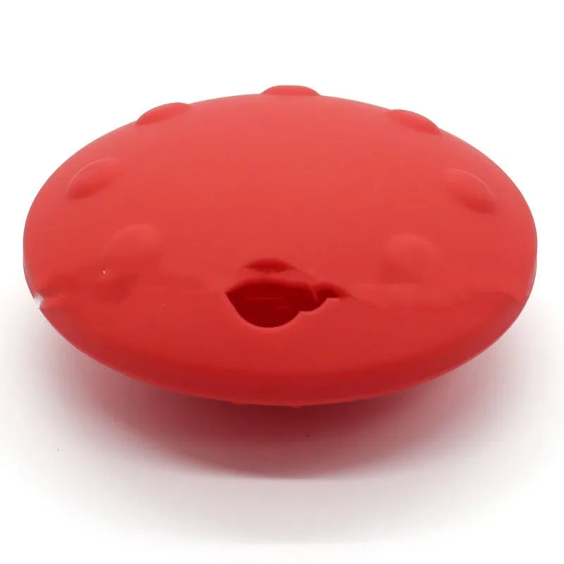 Pet drop-resistant silicone slow feeder frisbee in black, 120mm size, on white background