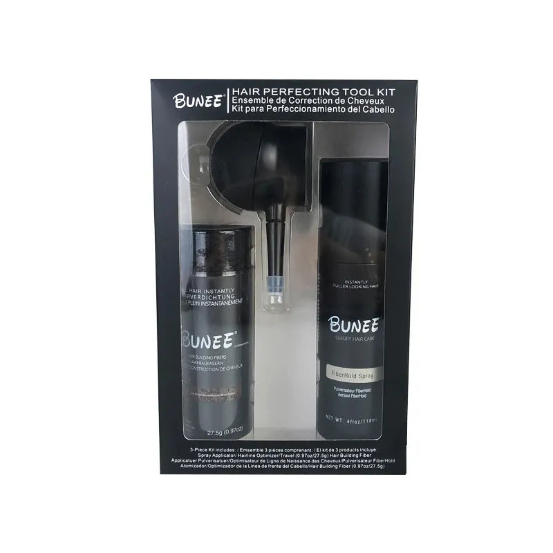 Box containing dense hair fibre powder canister, special applicator nozzle, and shaping spray bottle for hair styling.