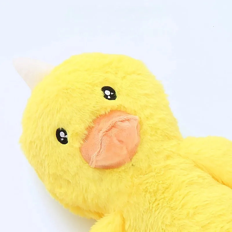 Large pink and yellow plush dog toy with squeaker and crinkle sounds for golden retriever sized breeds