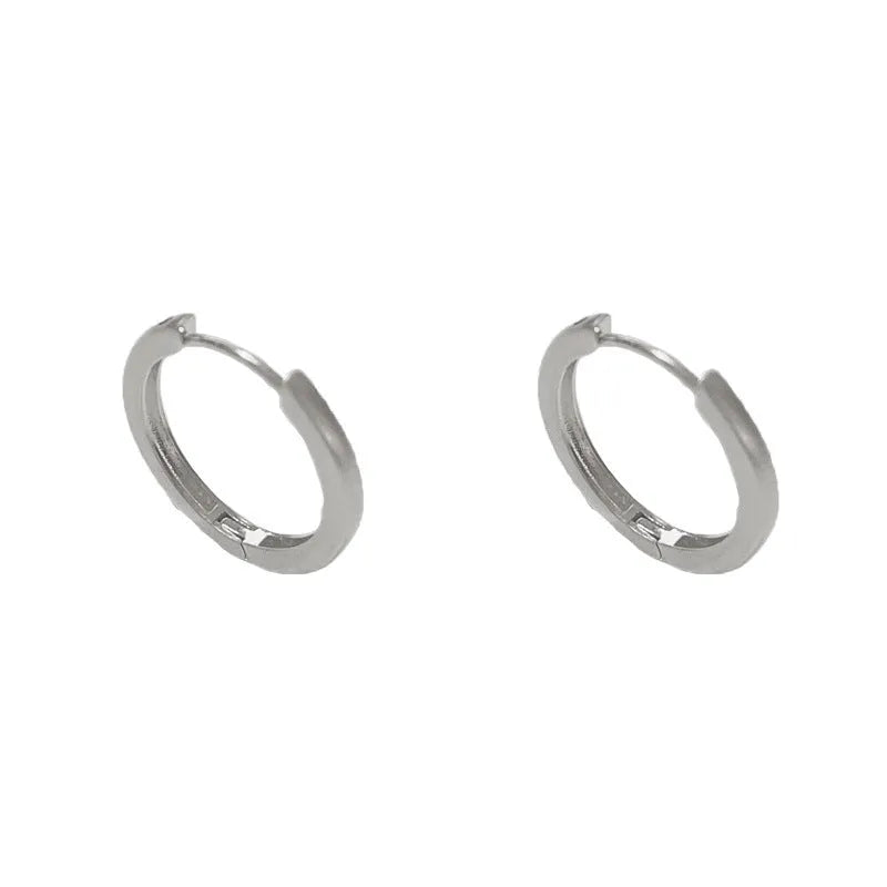 Geometric women's ear clips with gold plating and round eyelet design on copper material