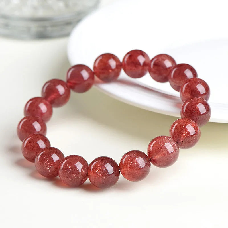 Natural starlight cherry red strawberry quartz bracelet with geometric spherical beads