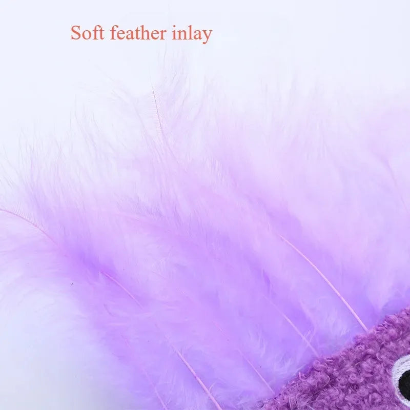 Plush cat toy shaped like a large head with a funny big mouth, in purple colour.