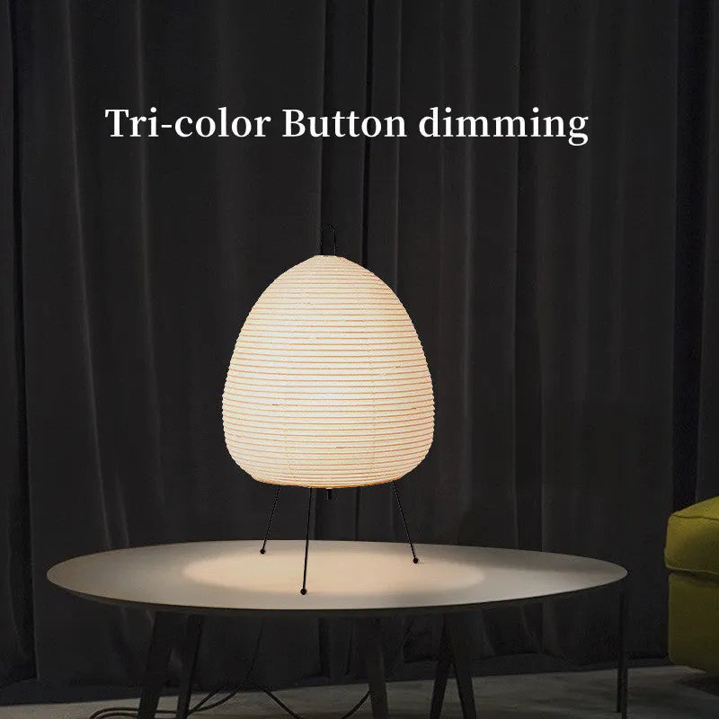 Handmade Nordic-style table lamp with a Japanese rice paper shade and aluminium base on a wooden table