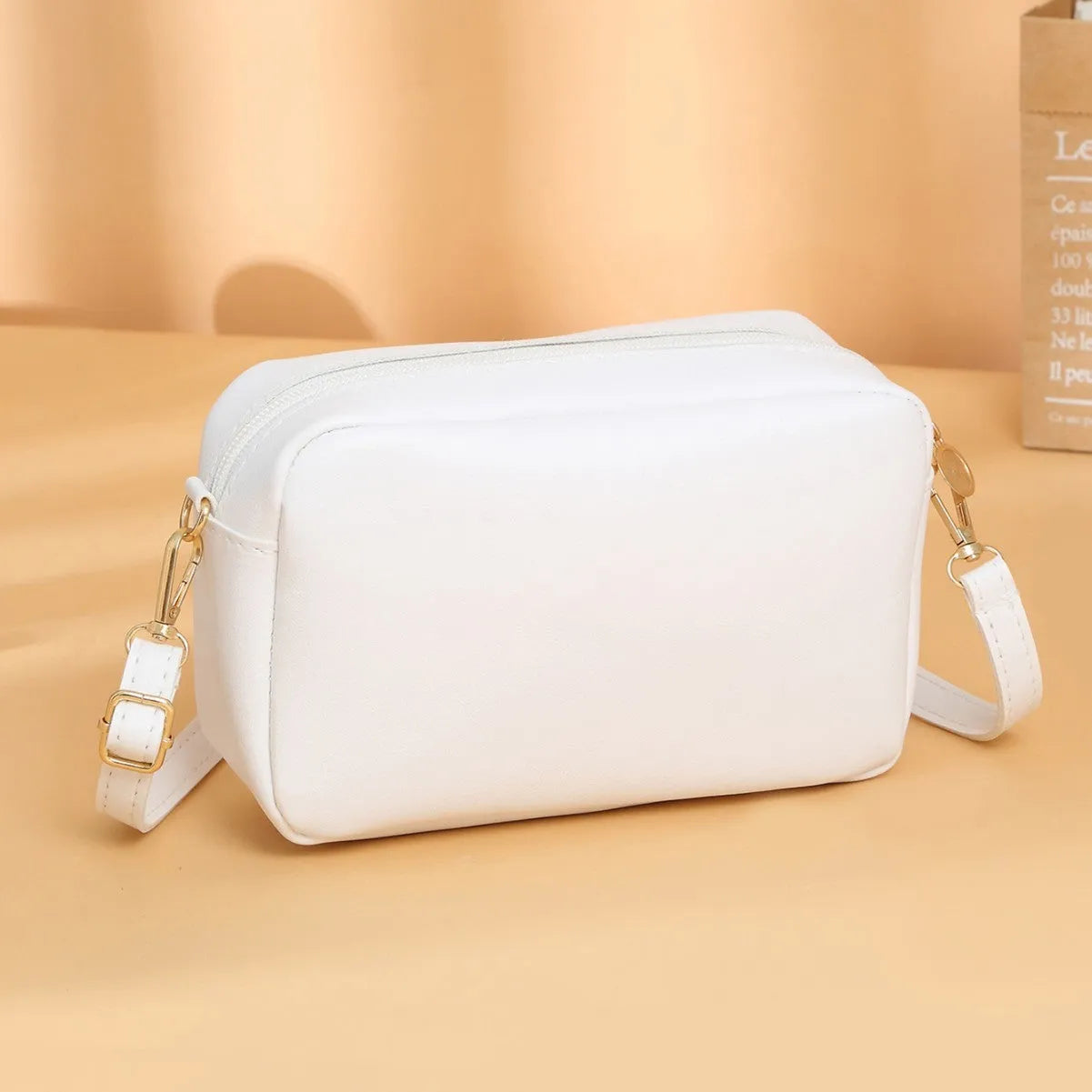 A square-shaped PU leather shoulder bag for women in an urban style, shown in multiple colour options.