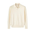 Pure wool polo sweater with lapel collar in loose fit, shown in milky white.