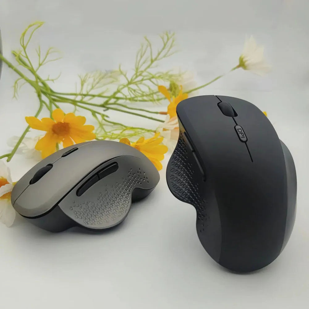 Black and grey self-charging wireless optical mouse for laptops with USB charging cable
