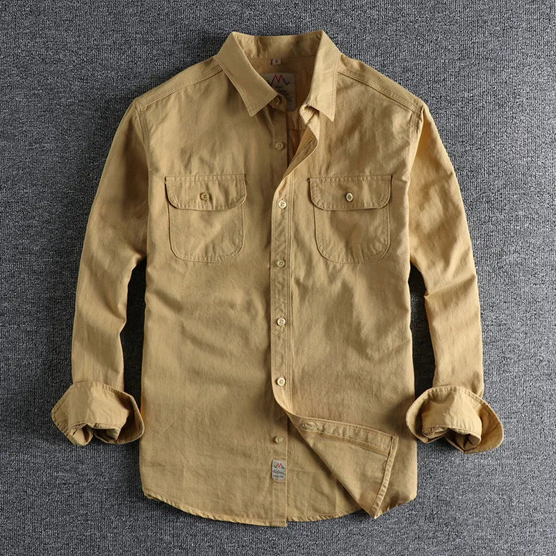 Men's solid colour cotton cardigan shirt with long sleeves in light blue.