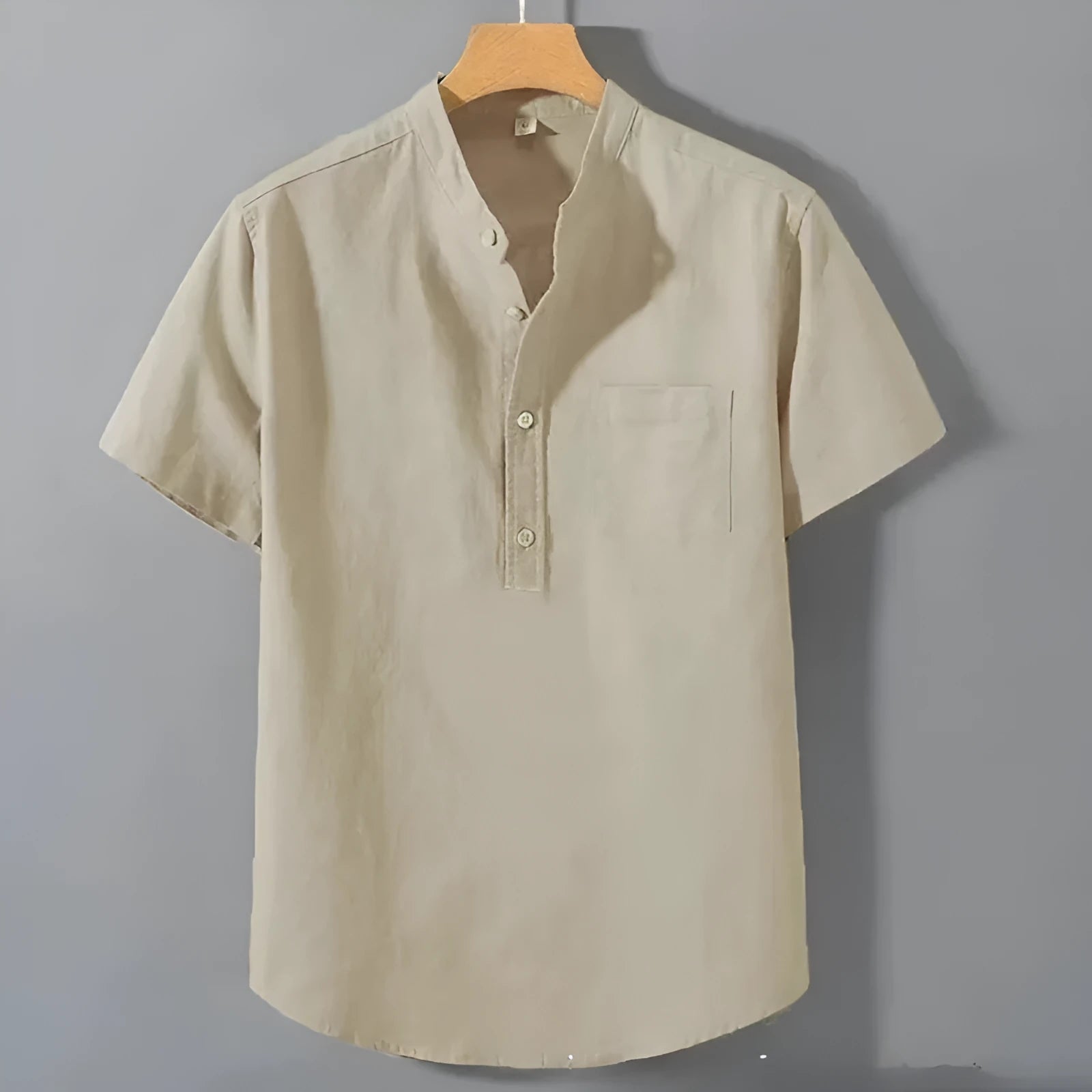 Men's beige casual short sleeve linen shirt with a stand collar and loose fit on a hanger.