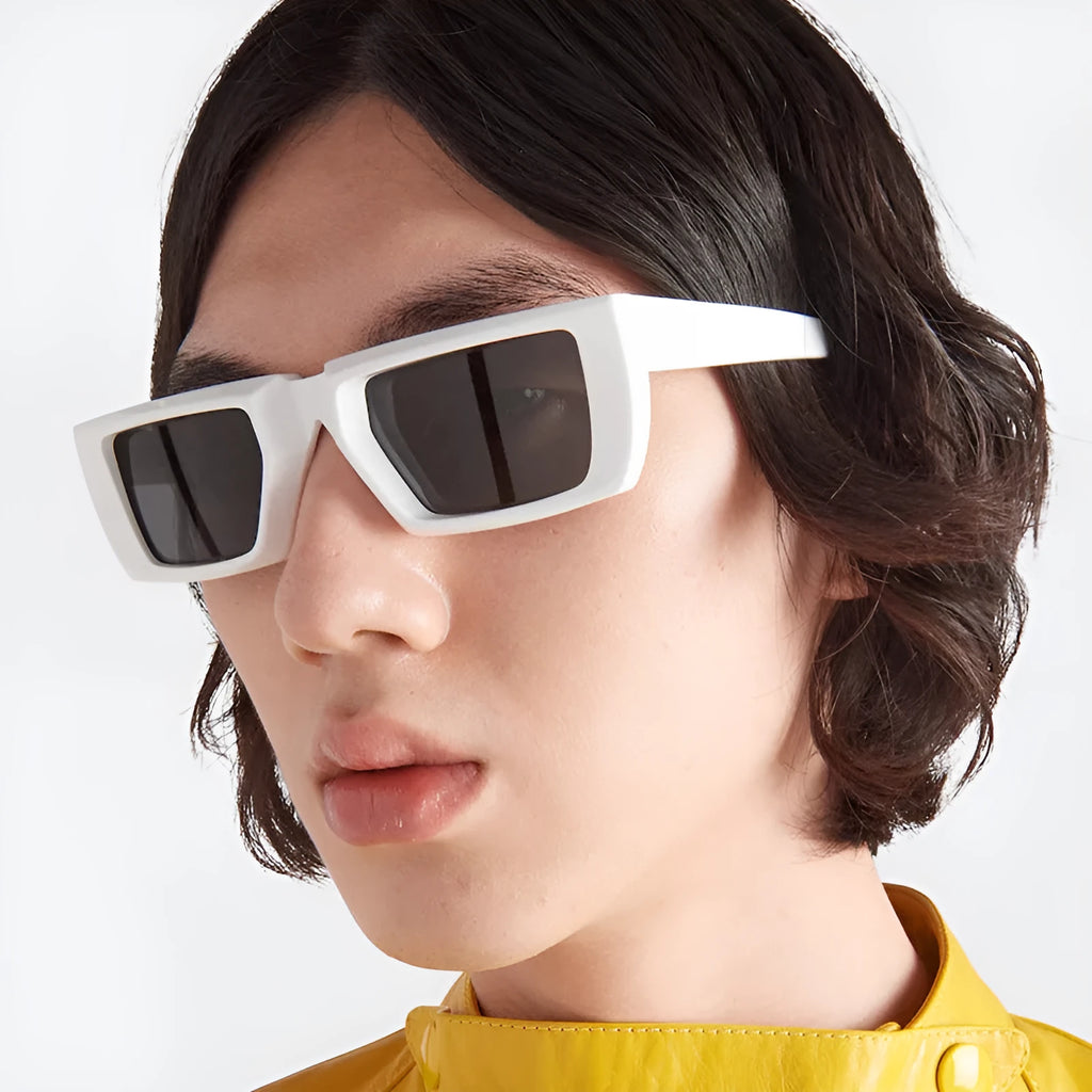 Y2K style sunglasses with UV400 protection in multiple colour combinations including black, grey, and transparent frames