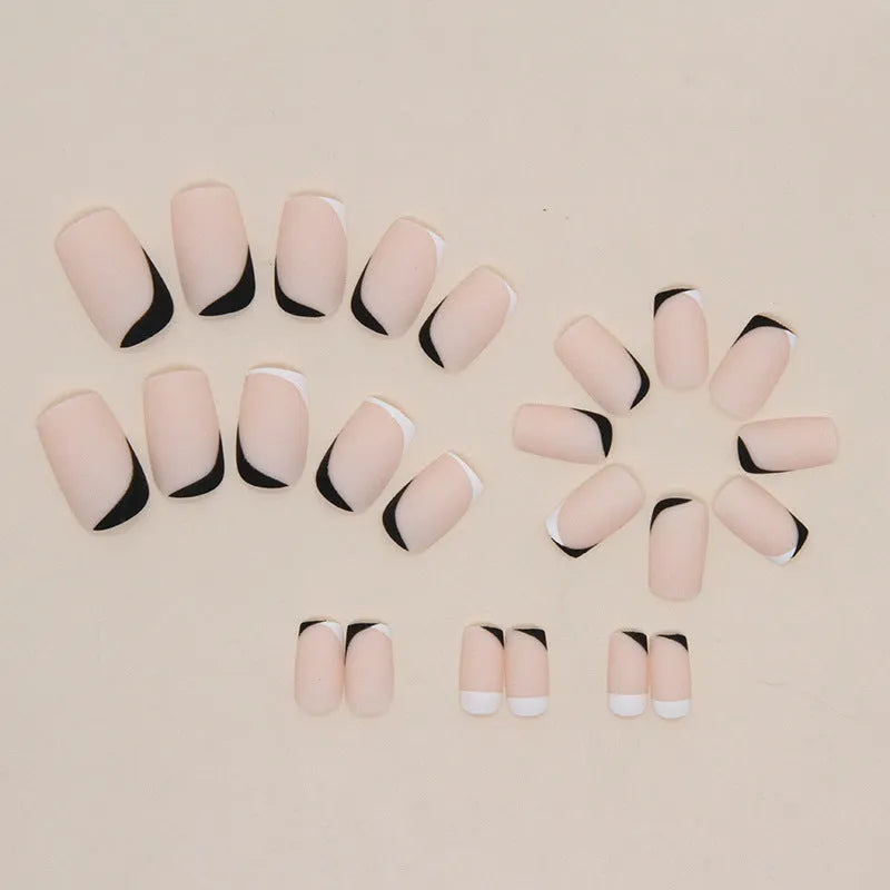 Black and white frosted artificial nails with mandarin duck colour design
