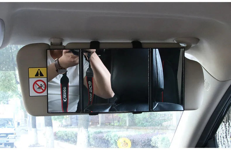 Silver folding car visor makeup mirror shown open and closed
