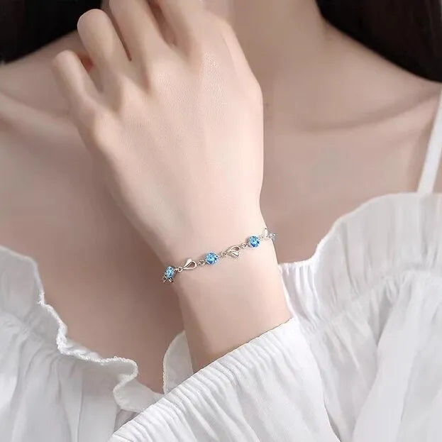 Blue diamond heart-shaped copper necklace and bracelet set with geometric designs and mixed gem inlays