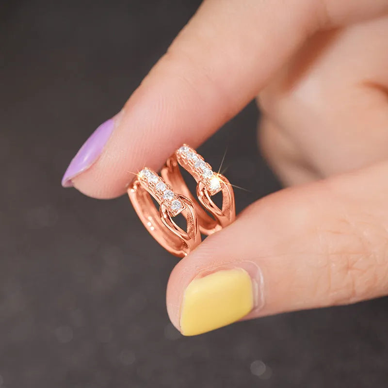 Copper geometric earrings with inlaid zircon in white gold colour on women