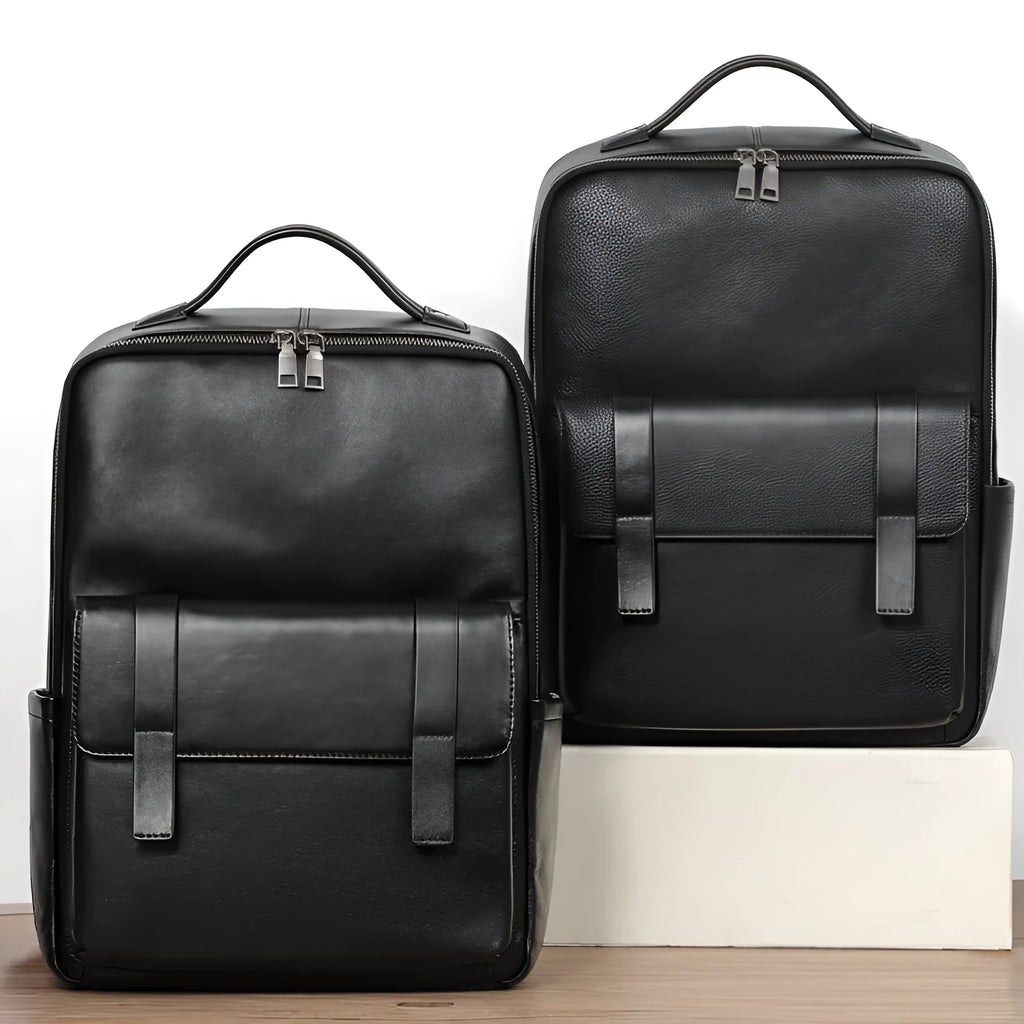 Black genuine leather men's computer backpack with a 36-55L capacity and contoured back plate.