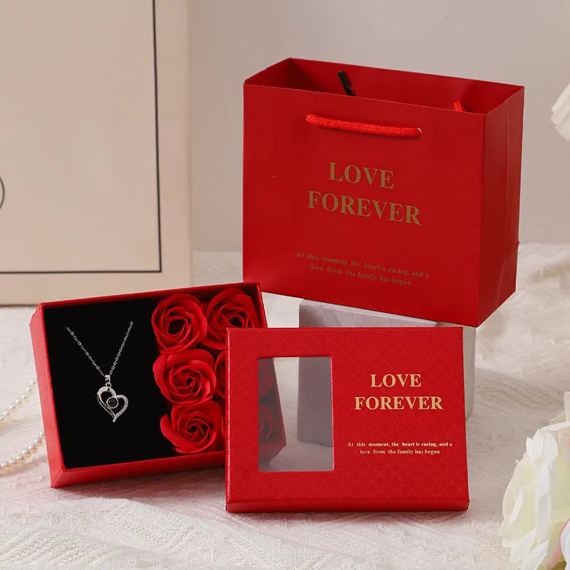 Red soap flower rose gift box set with decorative handbag for Valentine's Day.