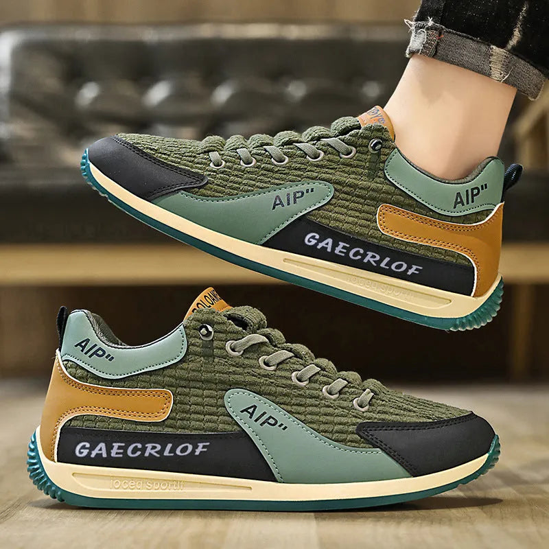 Men's grey and green mesh running shoes with round toe and lace-up front