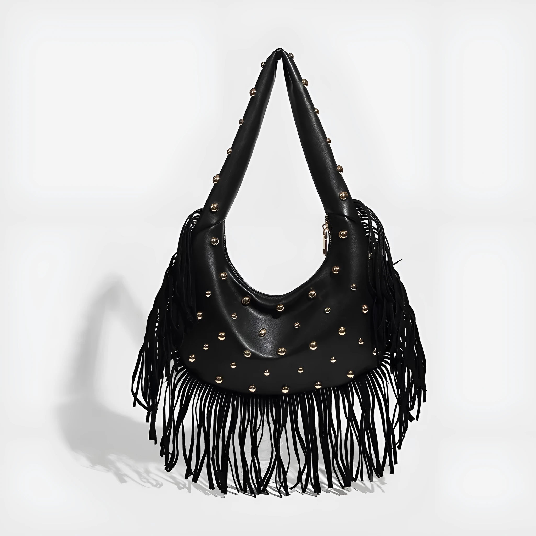 Retro style black shoulder handbag with a tassel decoration, shown with interior mobile phone pocket.