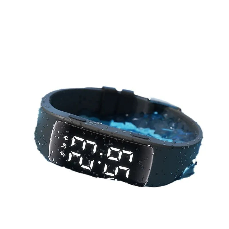 Vibration alarm waterproof electronic watch with coloured silicone strap and LED display.