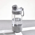 Heat-resistant plastic drinking cup in grey green or pink with cartoon pattern