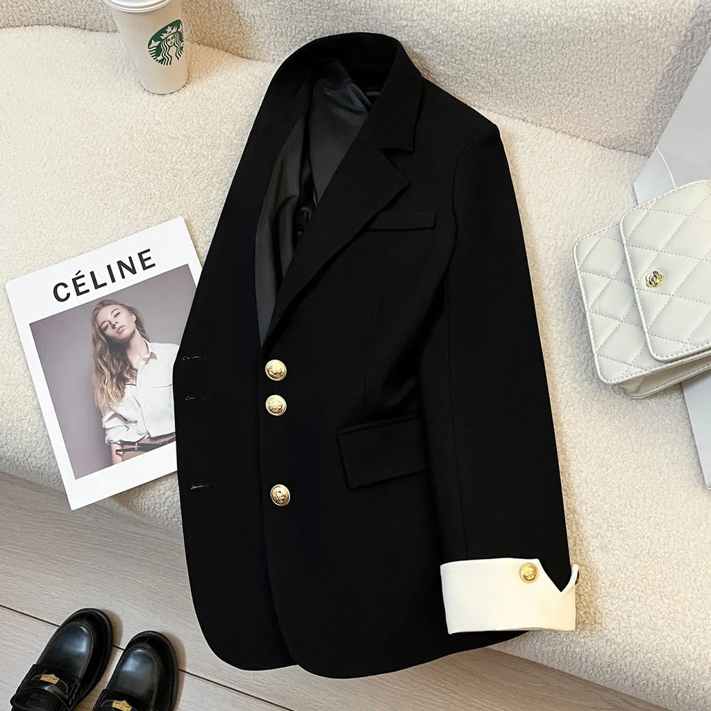 Beige Korean-style loose fit mid-length women's coat with long sleeves and pockets.