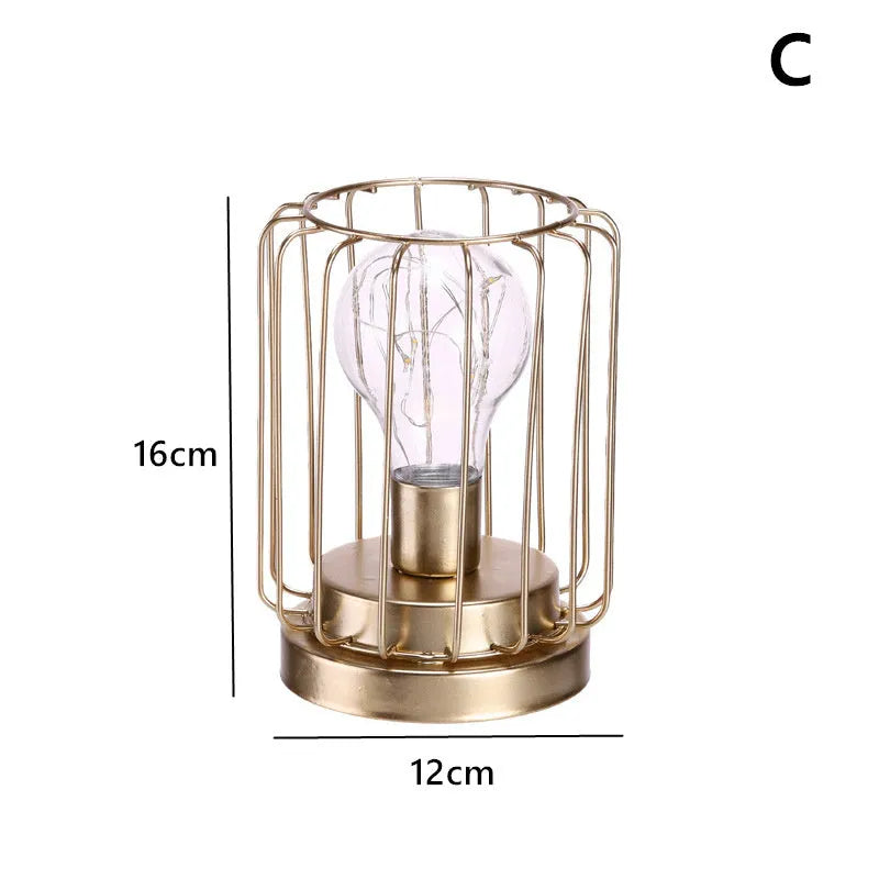 Geometric iron light bulb candle ornament with electroplated metallic finish, hanging as Nordic style home decor