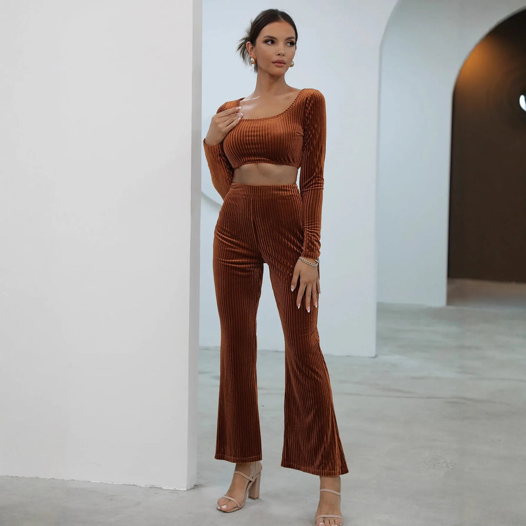 Women's caramel coloured long sleeve sweater and trousers loungewear set on a hanger.