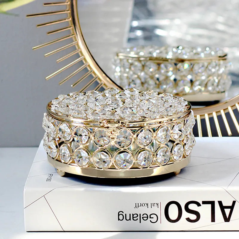 French gold metal frame jewellery box with transparent crystal glass panels displaying contents
