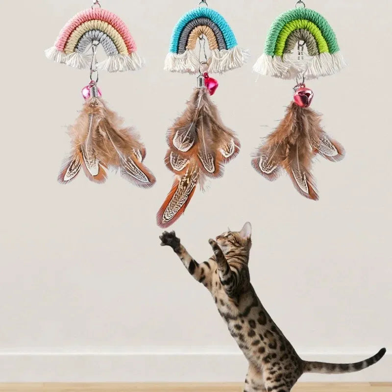 Blue feather rope cat toy hanging from door with elastic swing and sticky buckle clamp