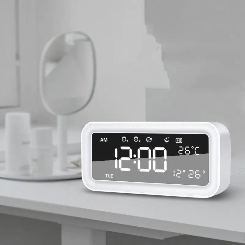 Blue rectangular LED atmosphere light alarm clock with digital display on quartz glass.