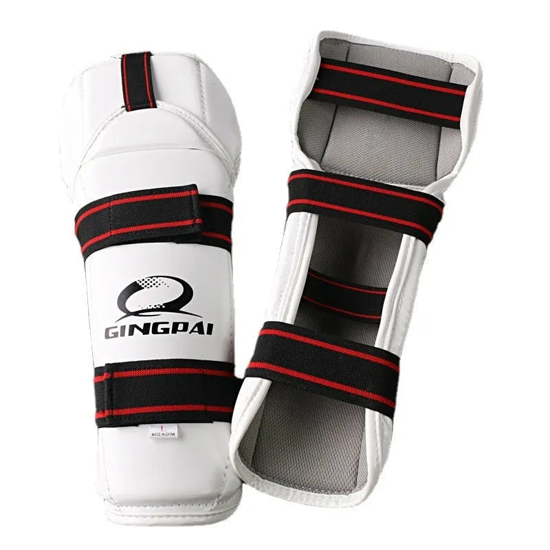 Taekwondo protective gear set showing arm guards, elbow arm guards, and leg protectors in various sizes
