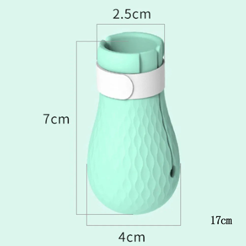 Set of four green silicone cat scratch protection gloves or foot covers.
