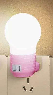 Compact round plug-in bedside baby lamp in white, blue or pink with white or warm light options