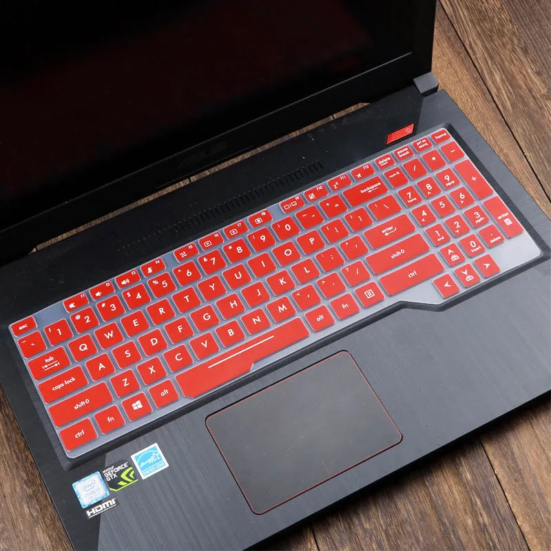 Transparent silicone keyboard protective film for ASUS Flight laptop on a keyboard.
