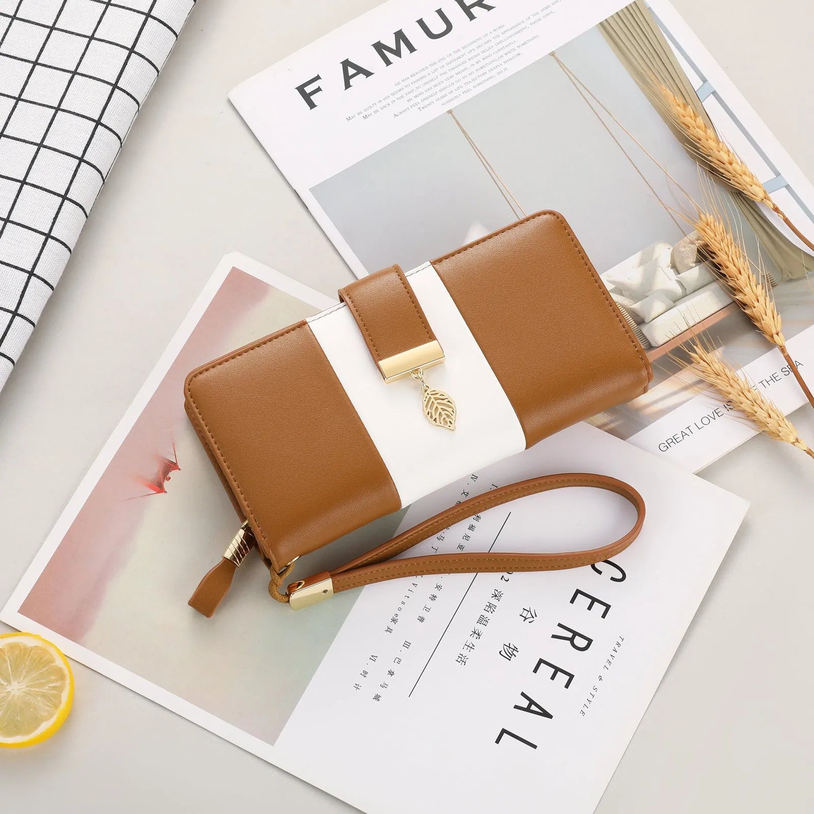 Anti-theft clutch handbag with lock closure in PU leather showing interior organisation and colour options
