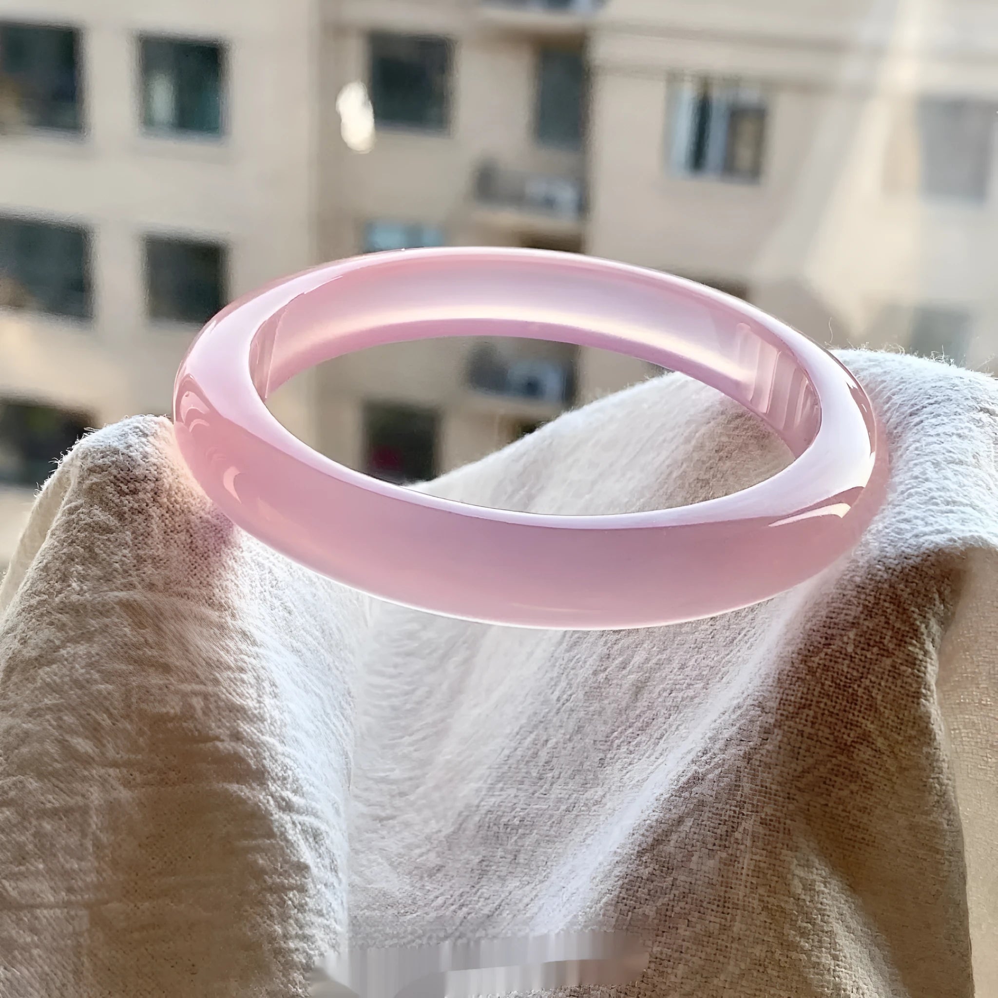 Natural agate wide tire bracelet showing polished stone band in multiple colour options