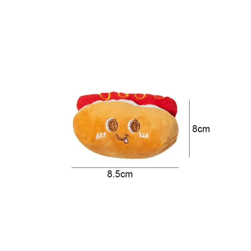 Set of five plush cat chew toys shaped like a hamburger, chicken leg, fries, bread, and hot dog.