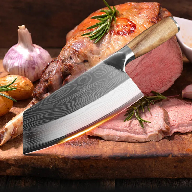 A 320mm stainless steel kitchen knife with a forged blade on a cutting board.