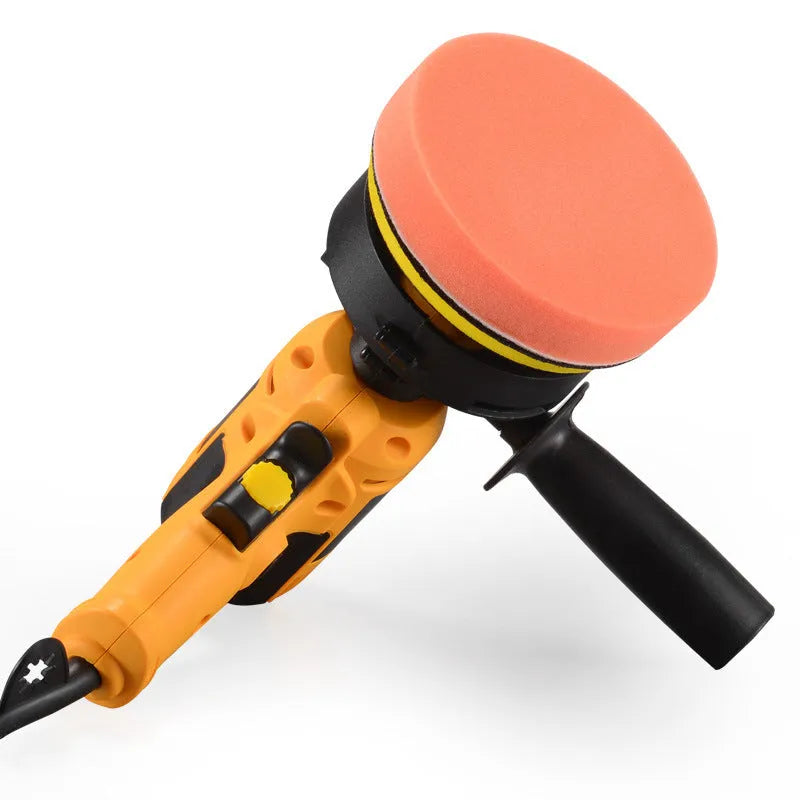 Yellow automotive polishing machine with 125mm disc on a workbench