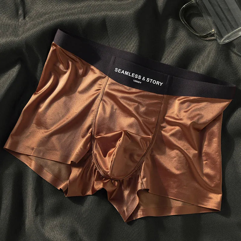 Men's light gray Ice Silk mid-waist underwear briefs laid flat.