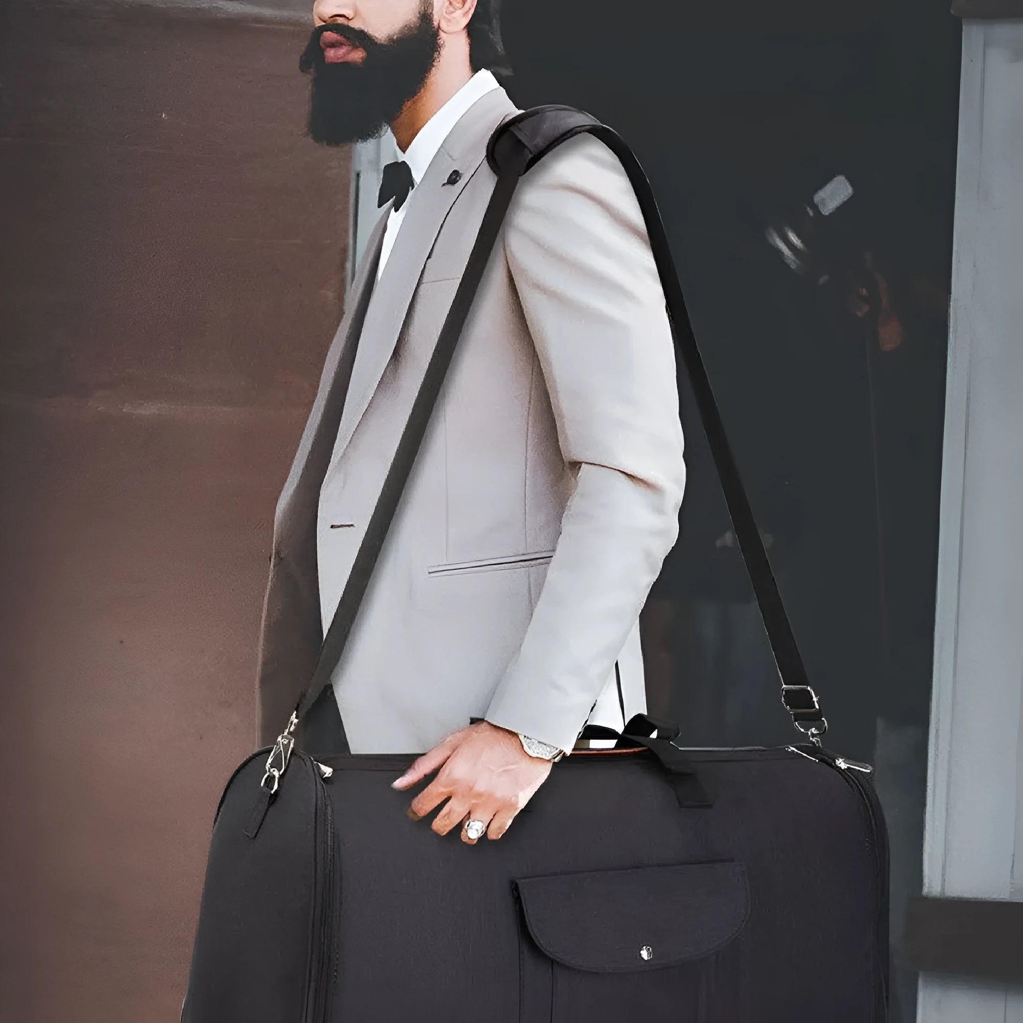 Folding duffel luggage bag in dark blue, grey, or black, suitable for business travel and gym.