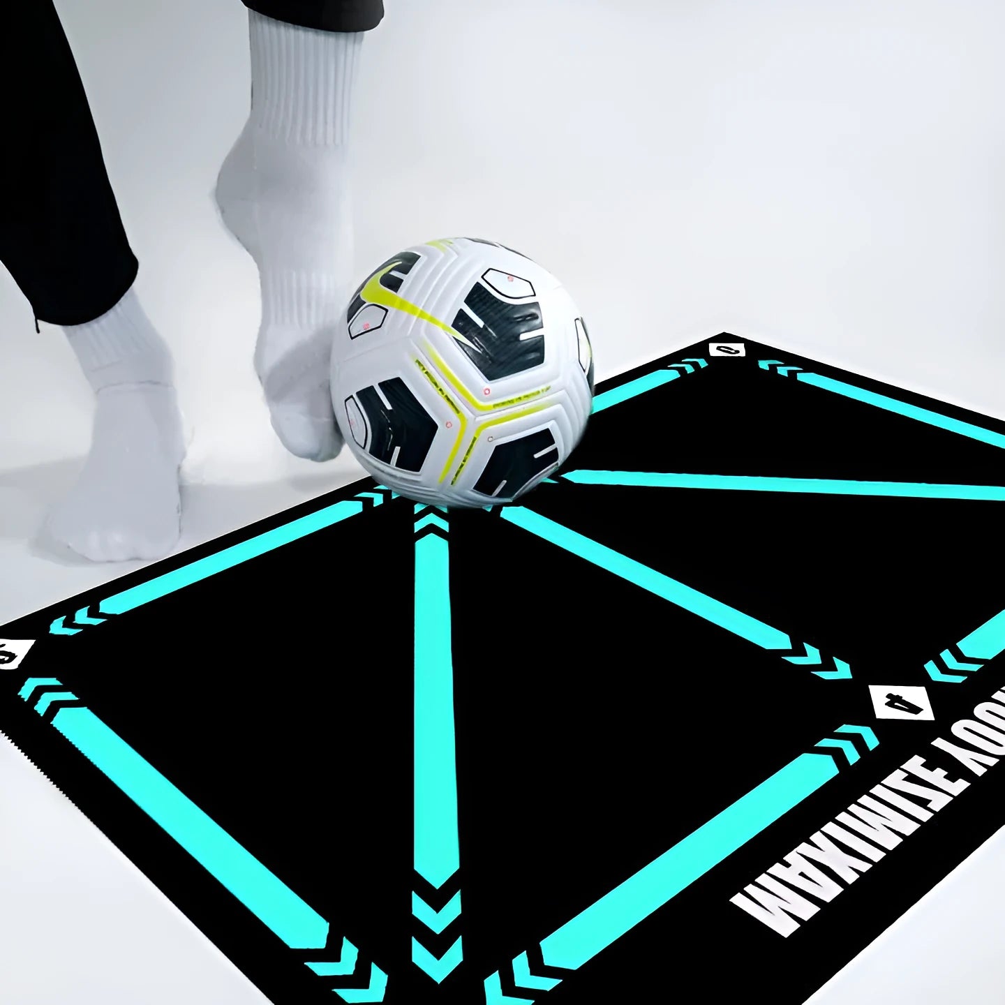 Football training mat with rubber surface in cushion colour for indoor skill practice